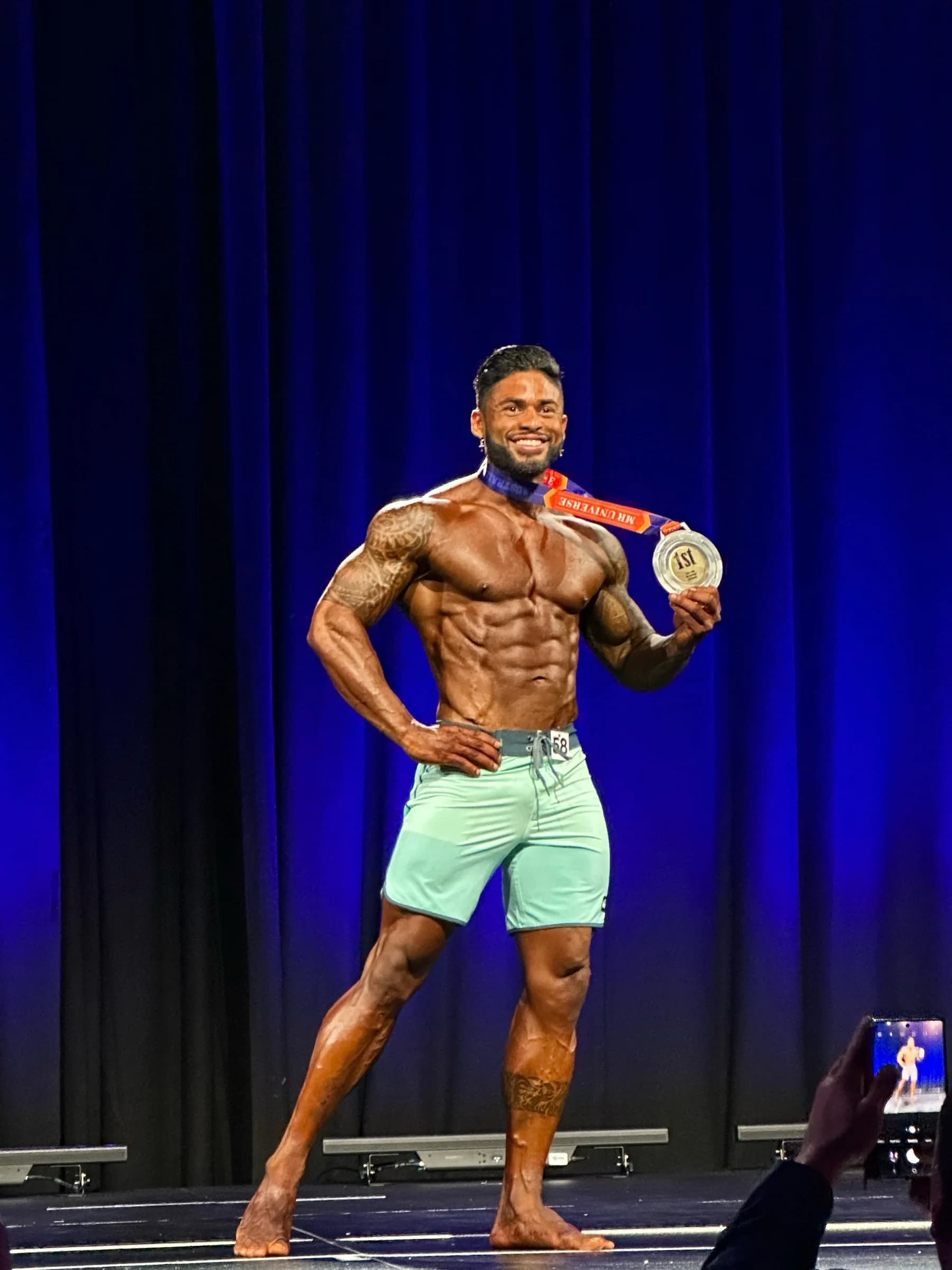 Ronan Costa posing on a competition stage